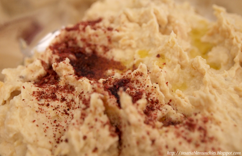 Hummus, with a topping of paprika and olive oil