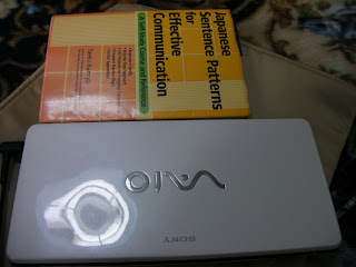 P91HS Vaio scaled with a book