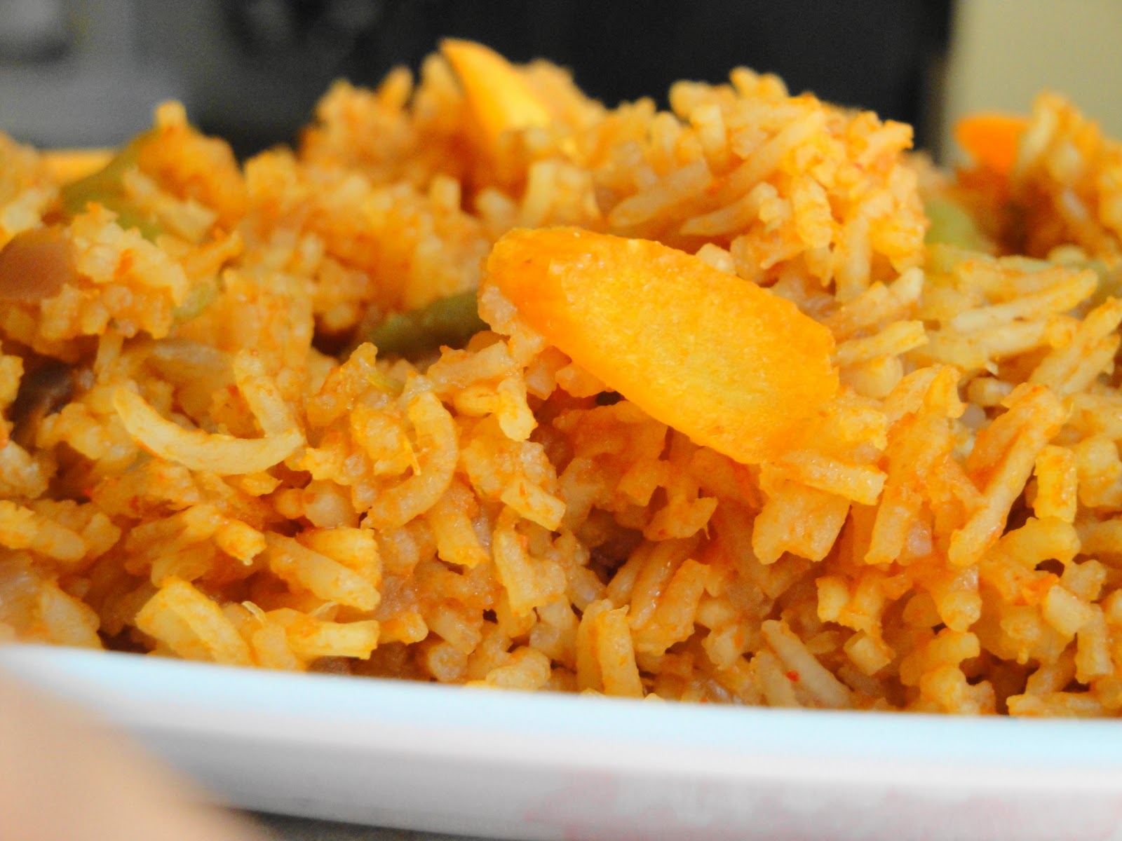 cumin and cardamom Jollof Rice ( Ghanaian )
