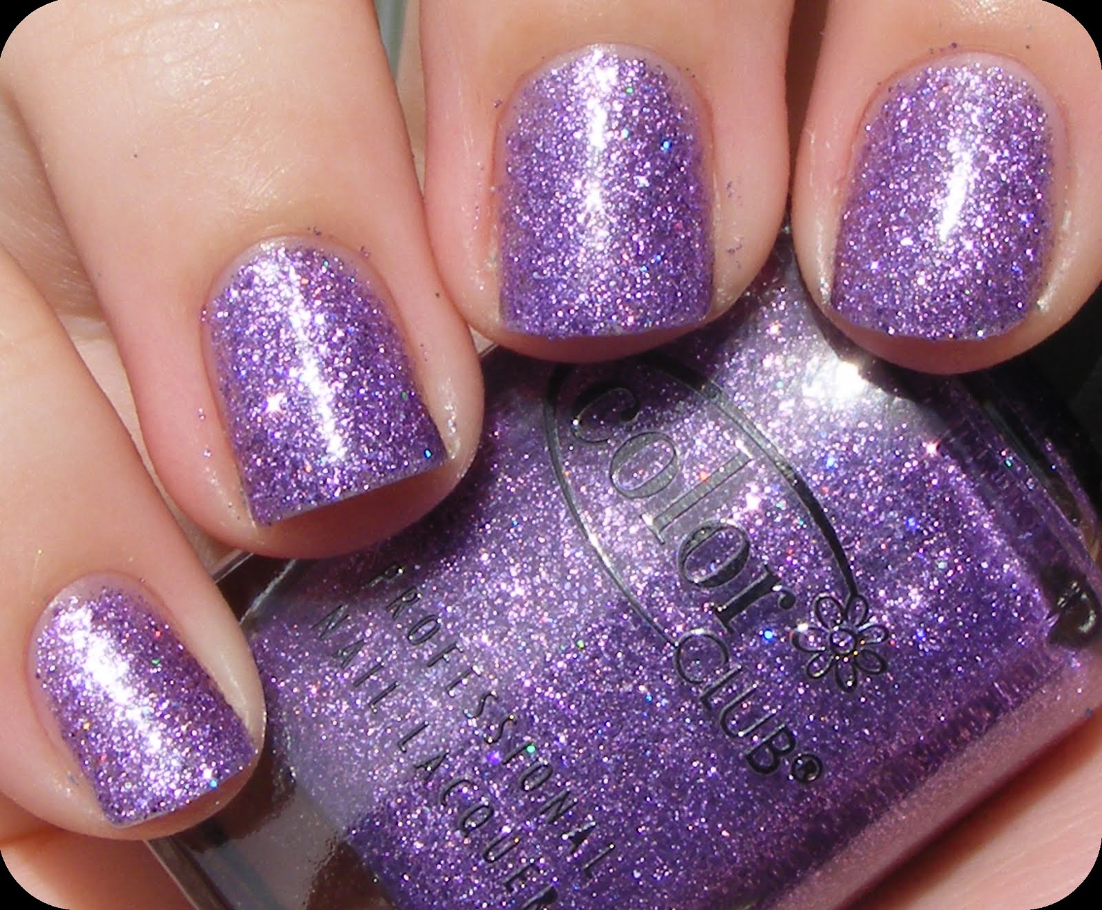 3. Black and Purple Glitter Nail Design - wide 6