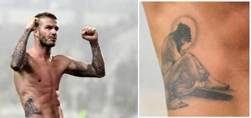 david beckham tattoos jesus. David Beckham and his new