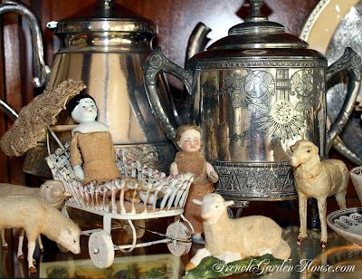 my antique dolls and sheep are