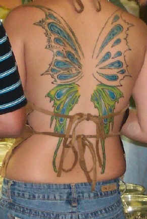 emo tattoos :: waves-and-flowers-lower-back-tattoo.jpg picture by jimbo0224
