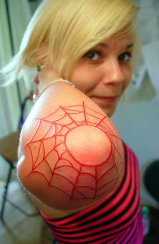 web tattoos is an art form for the girl who cobwebs in the arm.