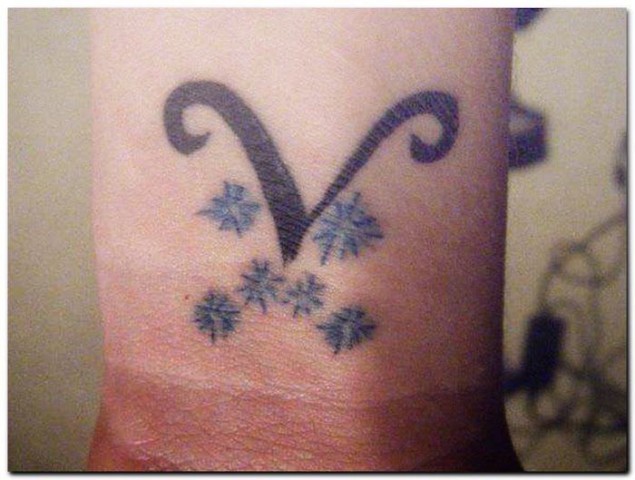 Most aries tattoo designs symbol are large and colorful, 