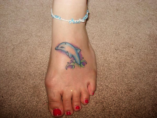 dolphin tattoos. small dolphin pictures