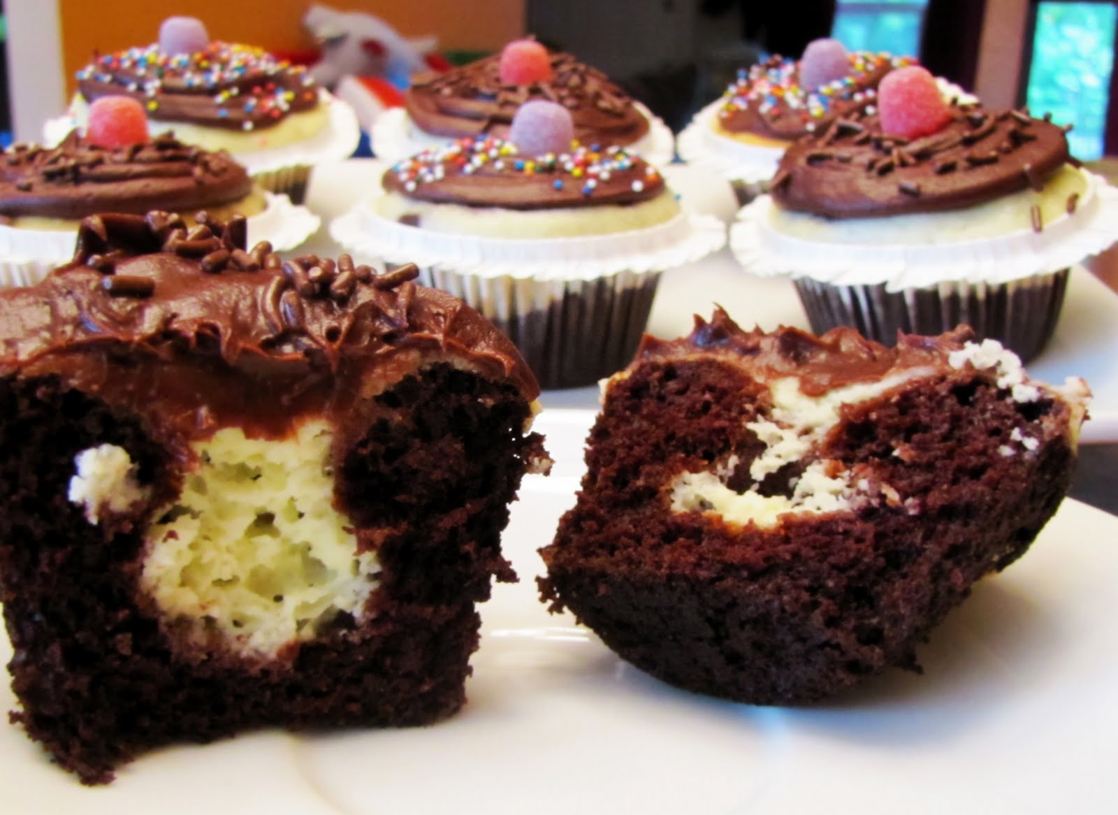 Rumbly in my Tumbly Black Bottom Cupcakes with Fudge Frosting