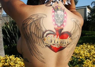 new mimi wings tattoo places:lotus-tattoo-art 00