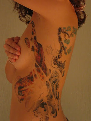 tattoo on rib cage for girls. tattoo on rib cage for men.