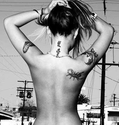 tribal tattoos for women back. upper ack tattoo tribal and