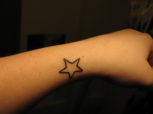 I also got a star tattoo over my IV scar. 'If you look real close you might 