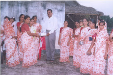 Getting Memendo from self help group members after giving Health Awerness speech 2006