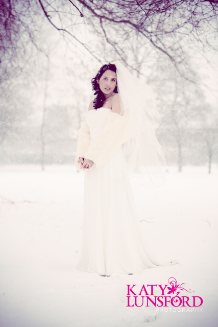 shoot in her wedding dress in the snow last week