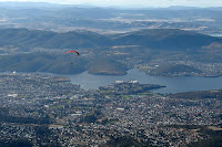 Paraglider sails off into the Hobart sky from near the Mount Wellington summit - 7th August 2010