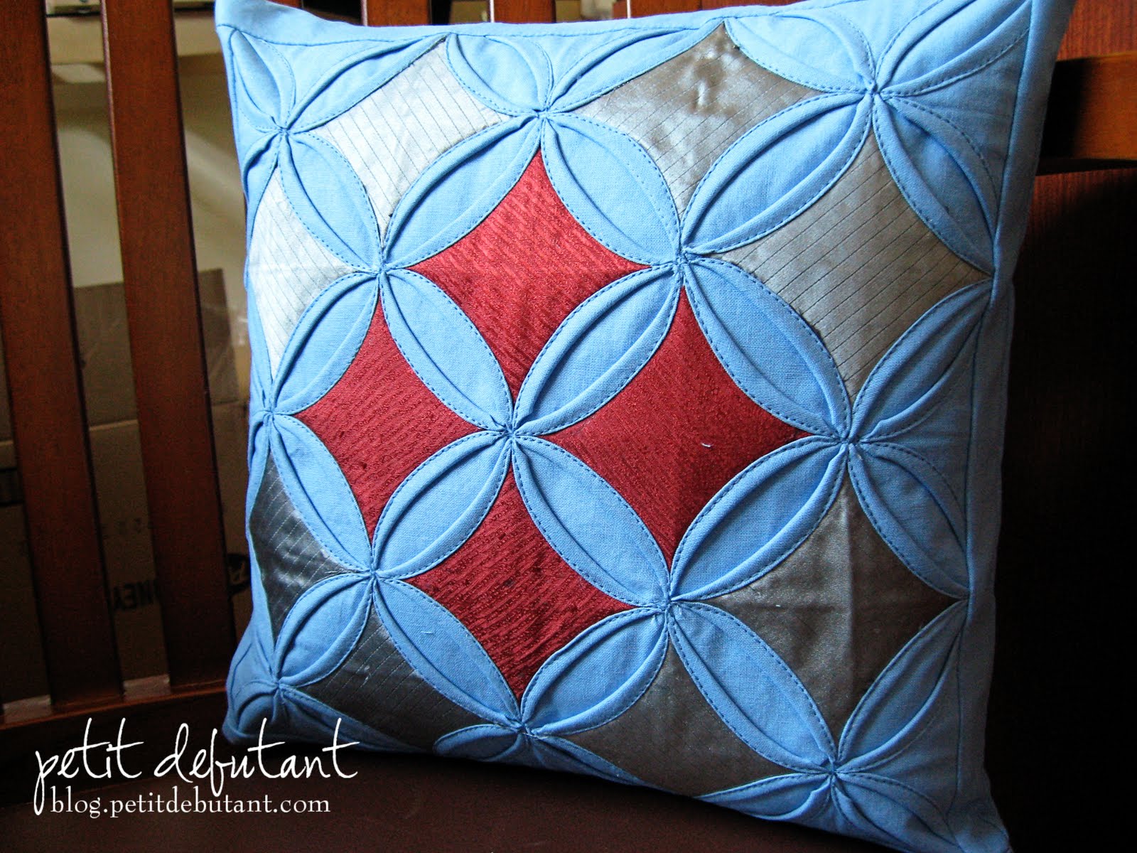 Petit Debutant Cathedral Window Pillow