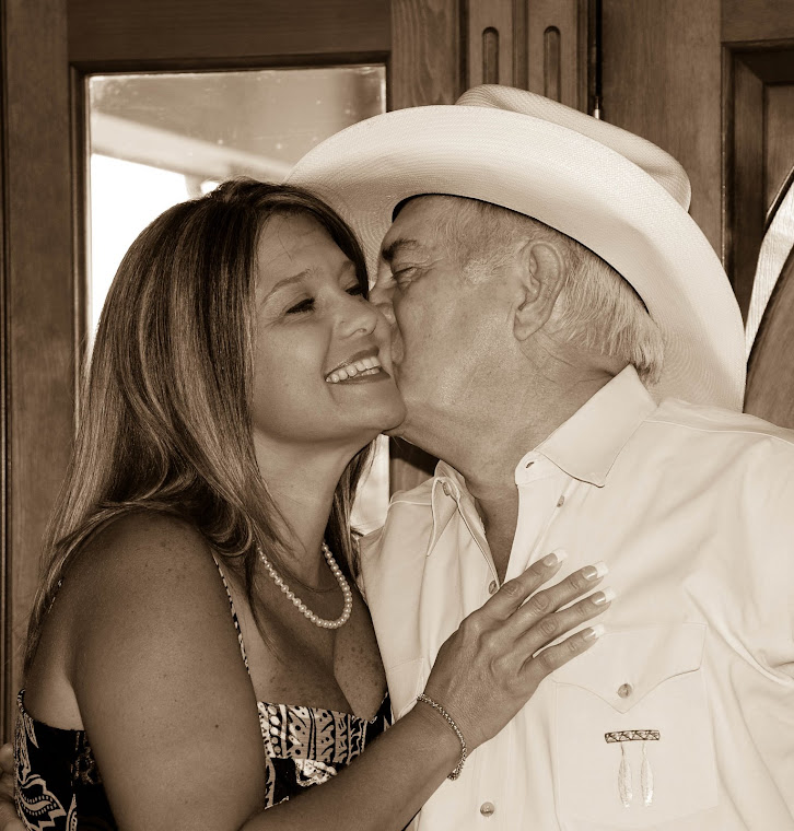 Father kissing the bride.