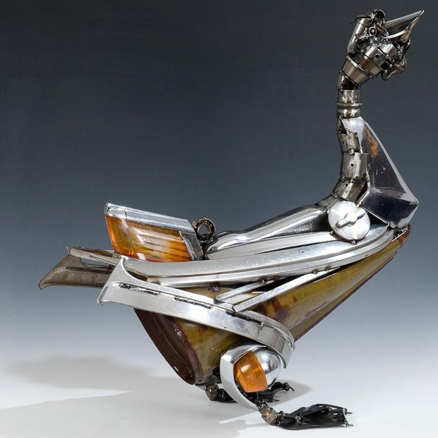 Esculturas com peças velhas de carros Esculturas com peças velhas de carros