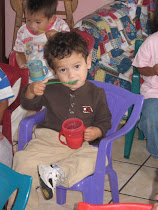 Mateo having his little drink