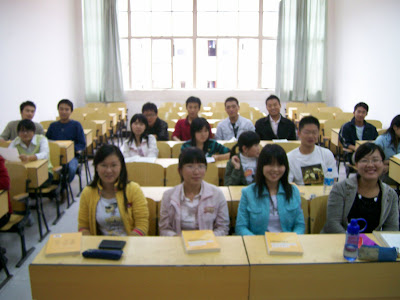 G A C E In China Students Desks And A Chalkboard