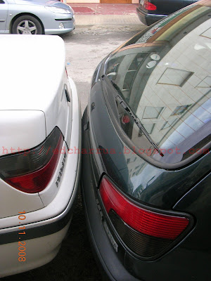 Coche+aparcado+a+menos+de+20cm+W.jpg