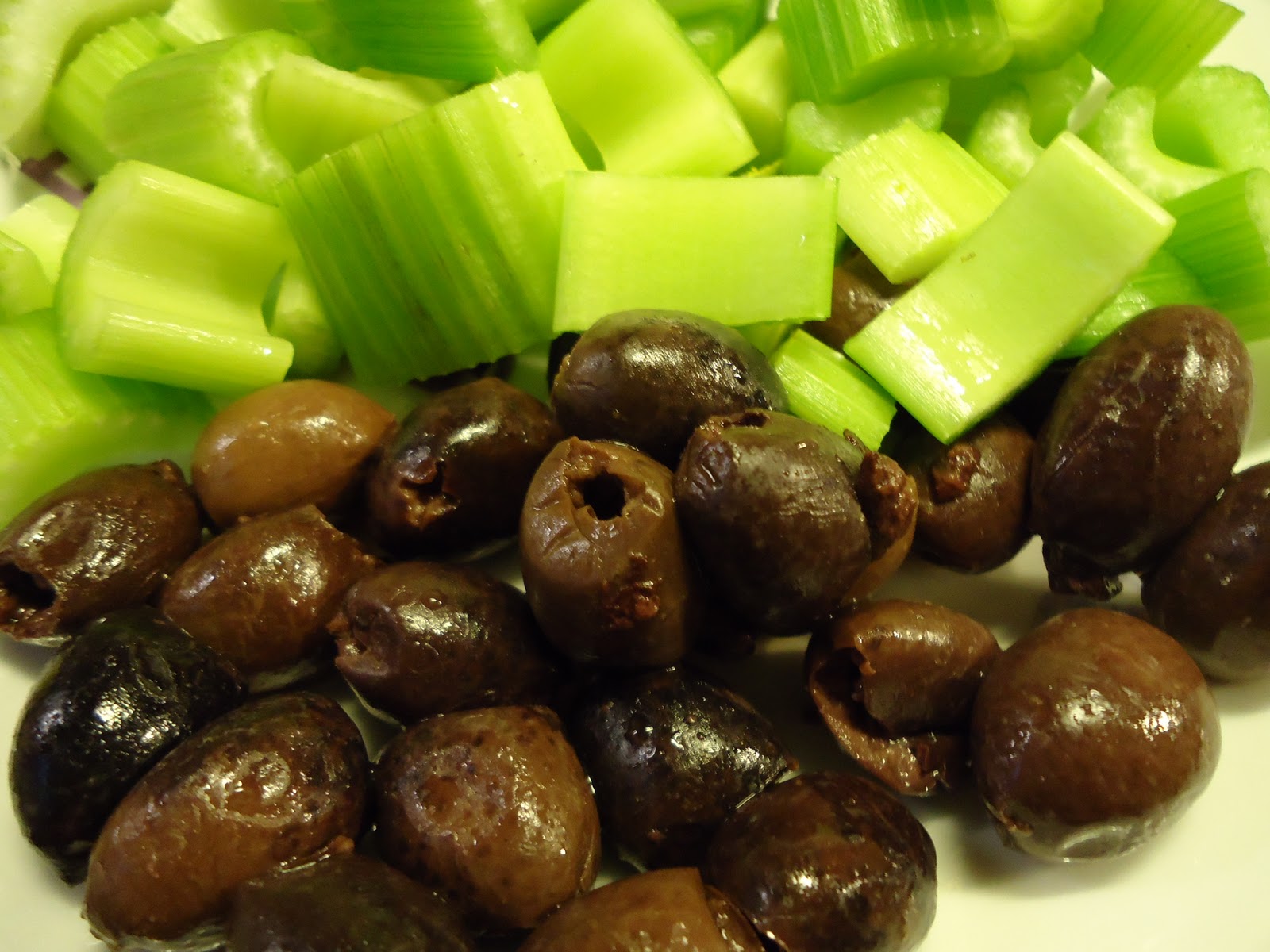 Get Skinny, Go Vegan. Raw Vegan Kalamata Olive Crostini from Ani Phyo's "Raw Food Essentials"