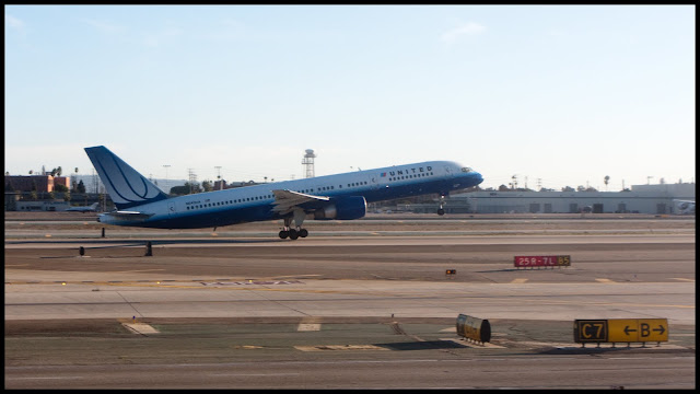 a plane taking off from a runway