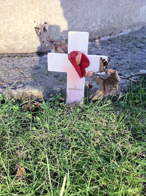 a cross with a heart on it