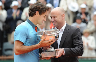 Federer getting then French Open Trophy from Agassi...