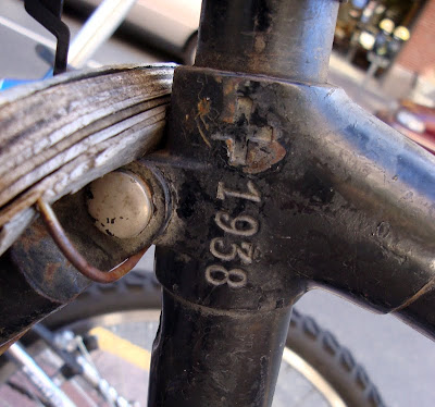 Swiss cross and 1938 mark on bicycle