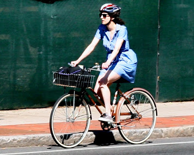 bright light lady on a bike
