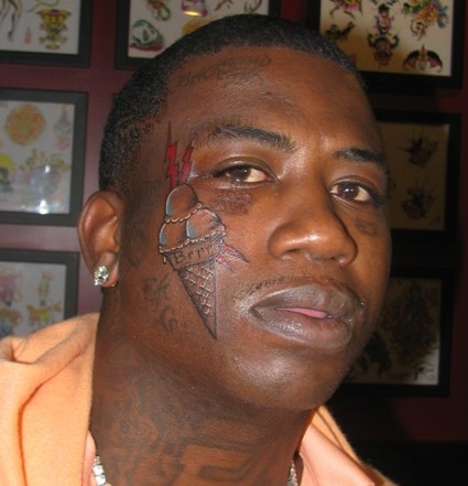 gucci mane tattoo. Gucci Mane, sporting a