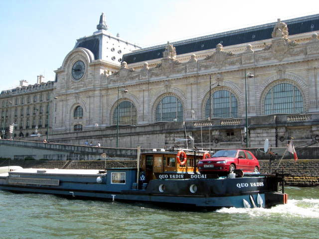 River boat showing car on roof