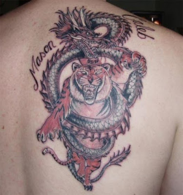 October 11th, 2010 at 08:01 pm / #tiger vs dragon tattoo