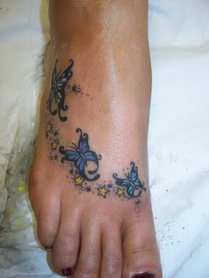 girl tattoos for foot. Butterfly Foot Tattoos