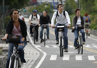 Bicyclists travel on New York City's West Street bike path