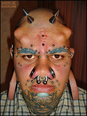 Extreme Body Piercing Modification Bull Nose Ring Spikes