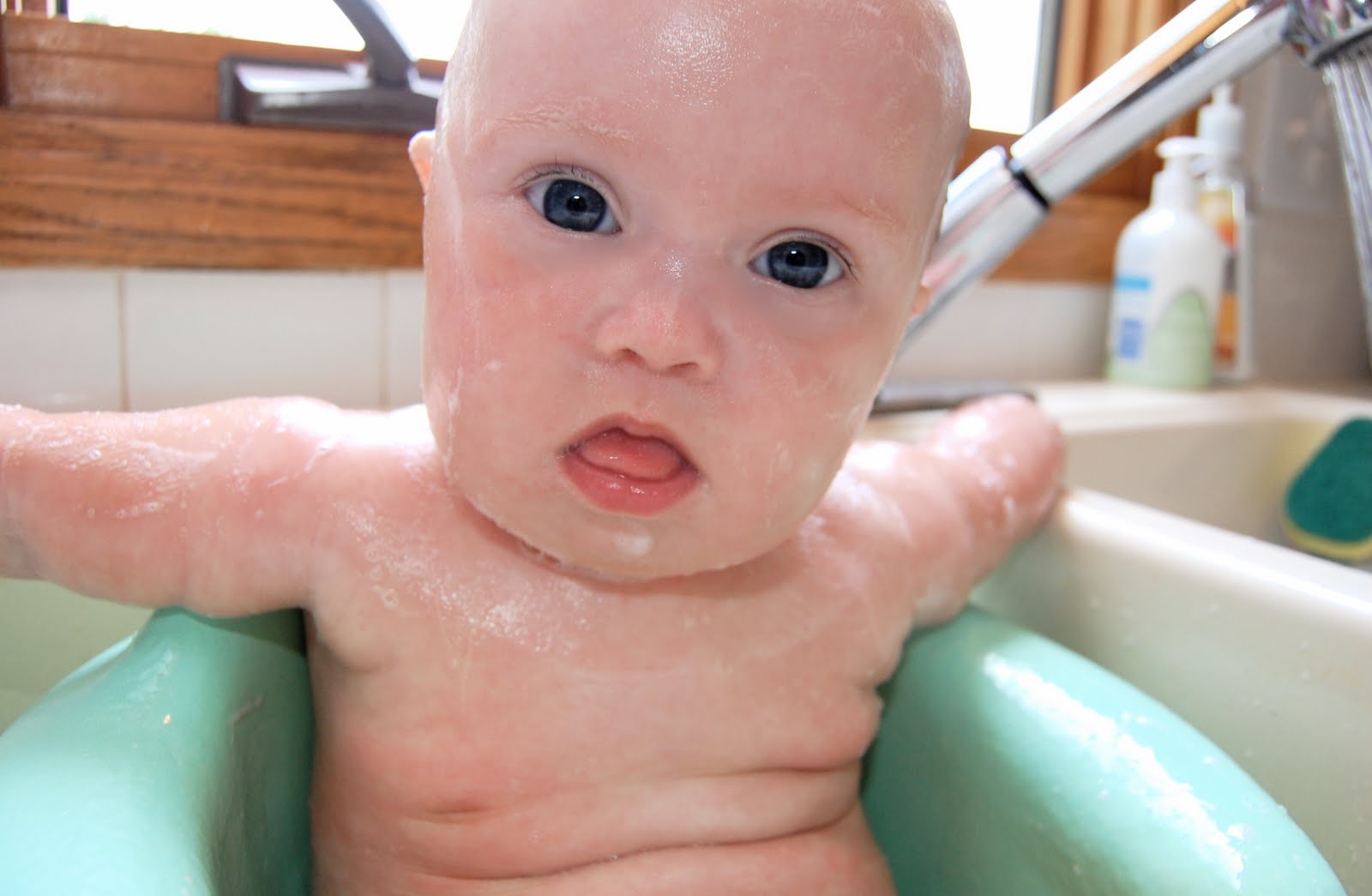 The Harnisch Family Baby Bathing in the Bumbo!