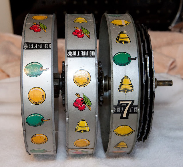 Restoring a Vintage Slot Machine Reel Bundle removal