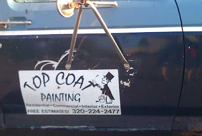 Sign on a truck door reading TOP COAT PAINTING. A little guy in a top coat is painting the last T in Coat