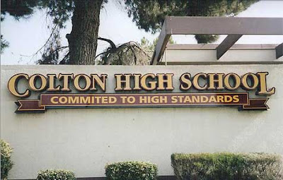 Sign reading Colton High School commited to high standards