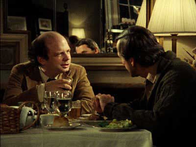 Wallace Shawn at left having dinner with Andre