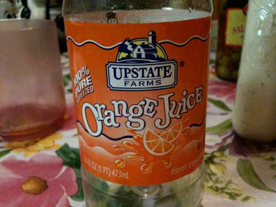 Orange juice label reading Upstate Farms Orange Juice