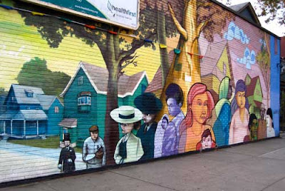 Colorful painted mural on a brick wall