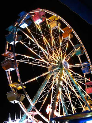 Ferris wheel with primary colored seats