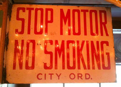 Old gas station sign warning about turning off engines and now smoking, extremely condensed but readable