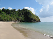 A small hidden beach with golden sand and no resort. (nui)