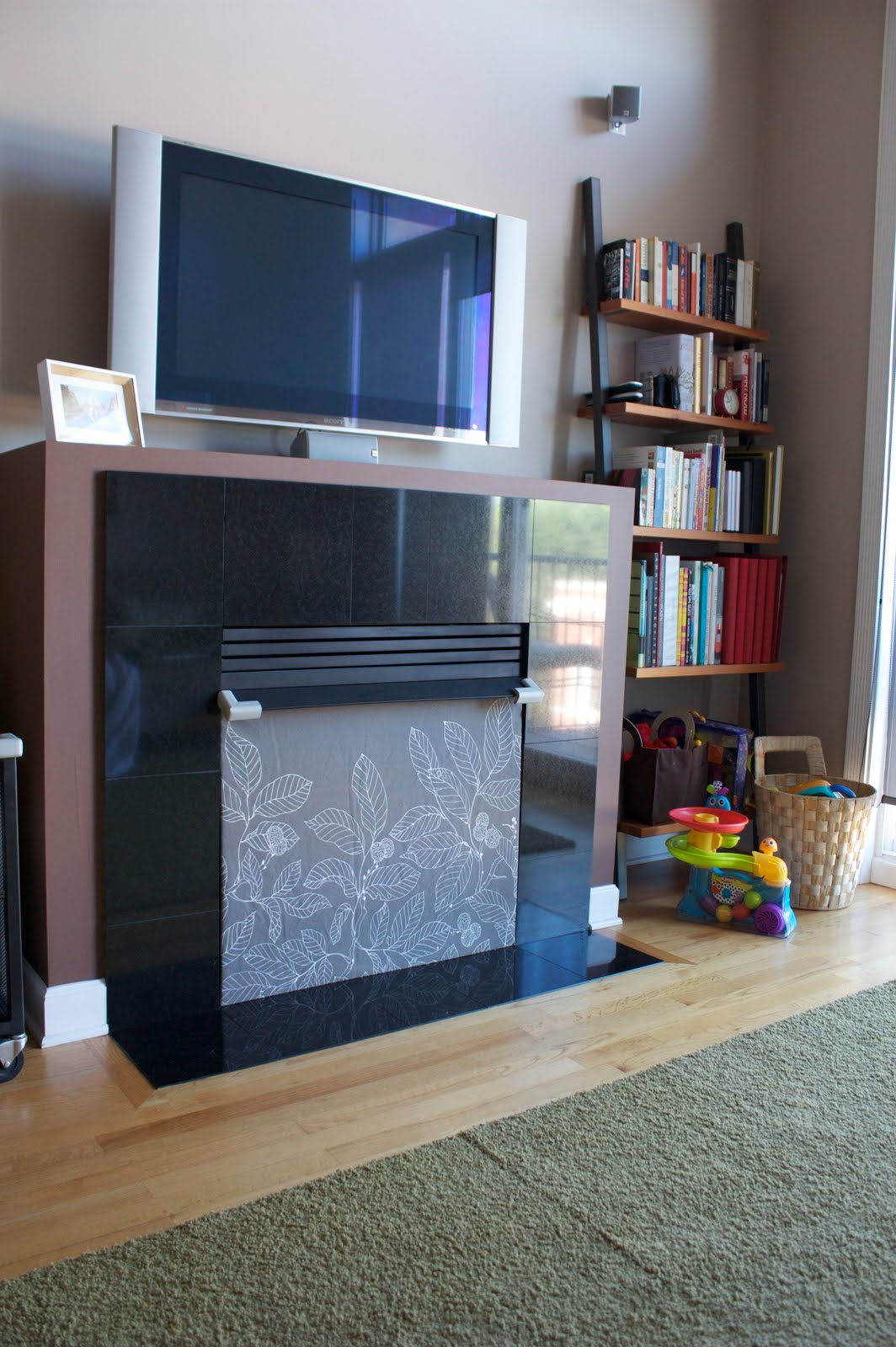 Mama Uses Needles Fireplace Babyproofed in Style...