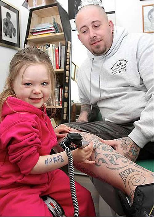 She also practices with a toy kit in her father's tattoo shop.