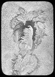 L1150-015 Lantern Slide, showing the form of a 'typical sunspot' by Langley, c.1880s © NMM