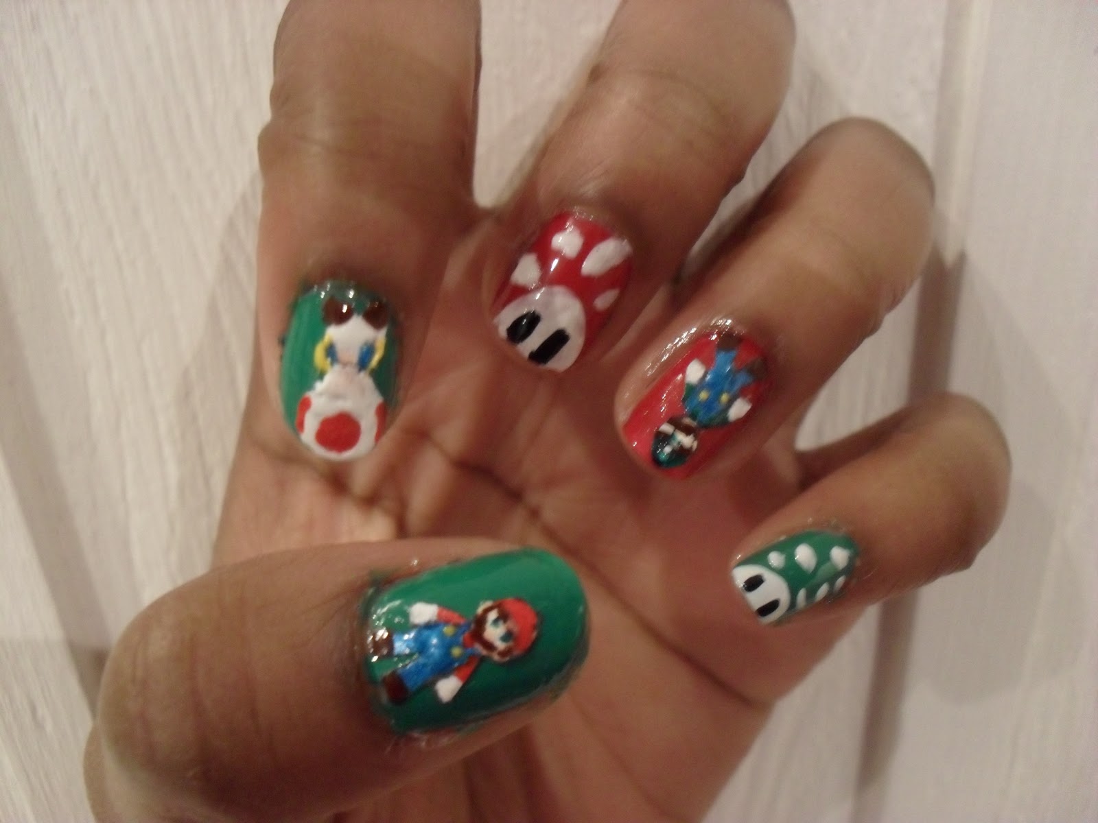 The nail art pen tolerated Mario but Luigi seems to be all eyebrow and